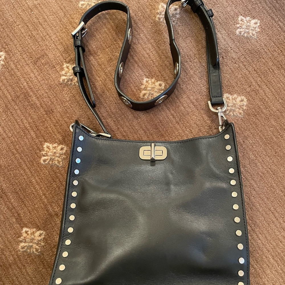 Michael Kors black leather bag.